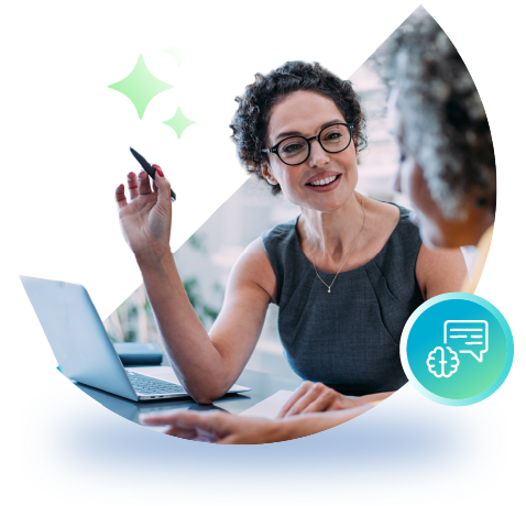 Smiling woman with open laptop talking to client