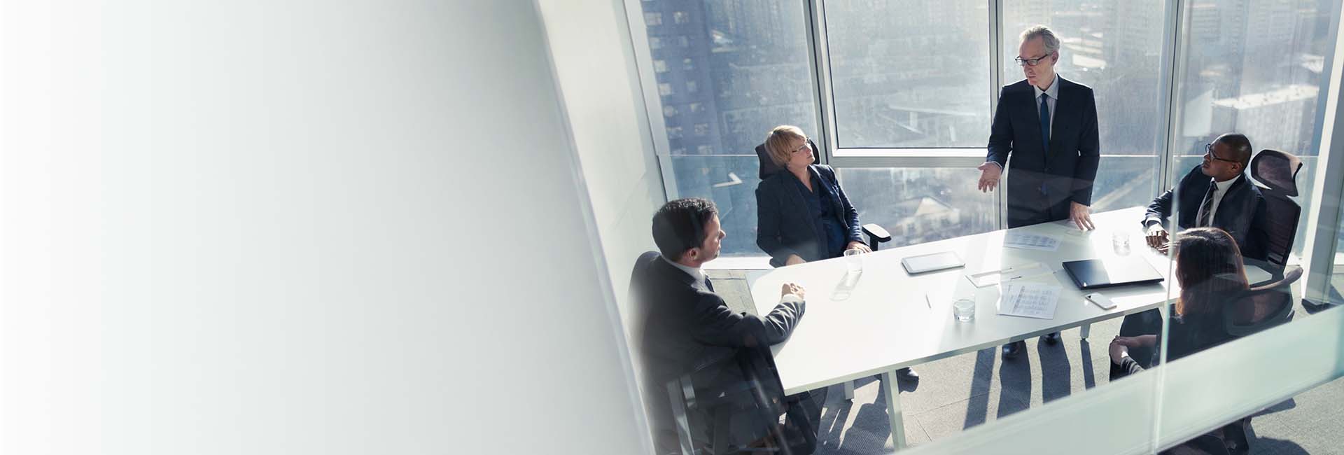 Advisors discussing wealth management software.